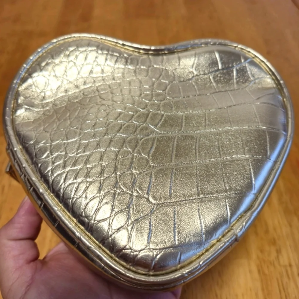 Cle de Peau golden Quilted Cosmetic Bag‎